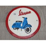 A REPRODUCTION CAST IRON VESPA ADVERTISING SIGN 24.5CM DIAMETER