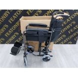 AN AIDAPT FOLDING WHEELCHAIR VA171HAM BOXED