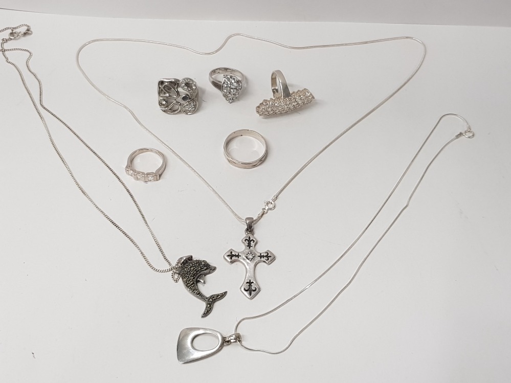 3 SILVER PENDANTS ON SILVER CHAINS INCLUDES CZ CRUCIFIX PLUS 4 SILVER DRESS RINGS AND 1 BAND RING,