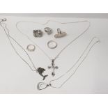 3 SILVER PENDANTS ON SILVER CHAINS INCLUDES CZ CRUCIFIX PLUS 4 SILVER DRESS RINGS AND 1 BAND RING,