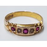15CT YELLOW GOLD RUBY AND PEARL 5 STONE RING COMPRISING OF 3 ROUND RUBYS AND 2 PEARLS IN CLAW