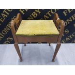 BROWN PAINTED PIANO STOOL WITH UPHOLSTERED SEAT CONTAINING SHEET MUSIC