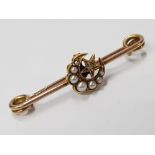 YELLOW GOLD MOON AND STAR BROOCH COMPRISING OF A MOON SET WITH SEVEN SMALL PEARLS WITH A STAR SET