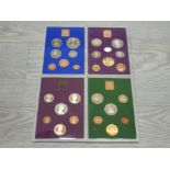 4 COIN PROOF SETS FROM GREAT BRITAIN AND NORTHERN IRELAND DATING 1970 1975 1977 AND 1980