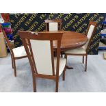 A MODERN CHERRY WOOD CIRCULAR BREAKFAST TABLE AND MATCHING CHAIRS BY BEAUTILITY TABLE 111CM