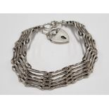 A SILVER 5 BAR GATELINK BRACELET WITH SILVER PADLOCK CLASP 18.4G