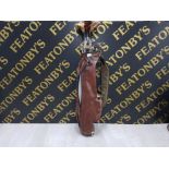 VINTAGE LEATHER GOLF BAG WITH WILSON CUP DEFENDER CLUBS ETC