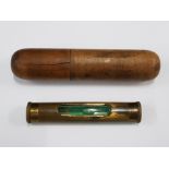 A LATE 19TH CENTURY MINIATURE BRASS SPIRIT LEVEL HOUSED IN AN ASH WOOD TREEN CASE