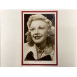 HOLLYWOOD STAR GINGER ROGERS SIGNED PUBLICITY POSTCARD WITH CERTIFICATE OF AUTHENTICITY