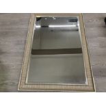 A LARGE MODERN BEVELLED WALL MIRROR IN SILVER FRAME 130 X 90CM