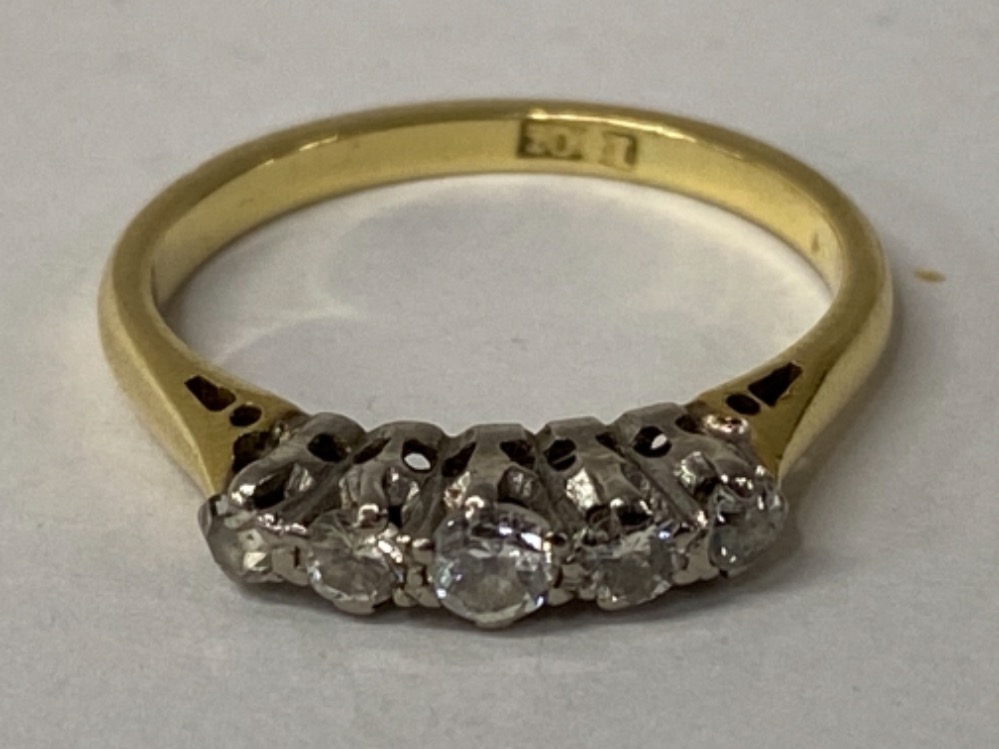 18CT YELLOW GOLD FIVE STONE DIAMOND RING COMPRISING OF FIVE ROUND CUT DIAMONDS SET IN A CLAW SETTING