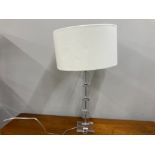 A LARGE MODERN GLASS AND CHROME TABLE LAMP WITH CREAM SHADE 58CM HIGH LAMP ONLY