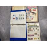 A SELECTION OF POSTAGE STAMPS FROM AROUND THE WORLD, HOUSED IN 3 STAMP ALBUMS