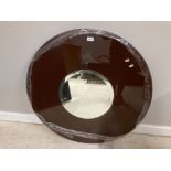 A CIRCULAR BEVELLED WALL MIRROR IN OPAQUE GLASS SURROUND 90CM DIAMETER