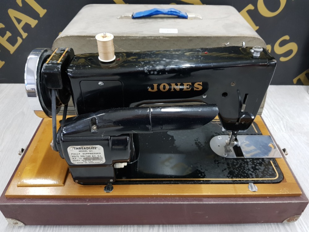 A VINTAGE JONES THREADLITE A1 SEWING MACHINE CASED