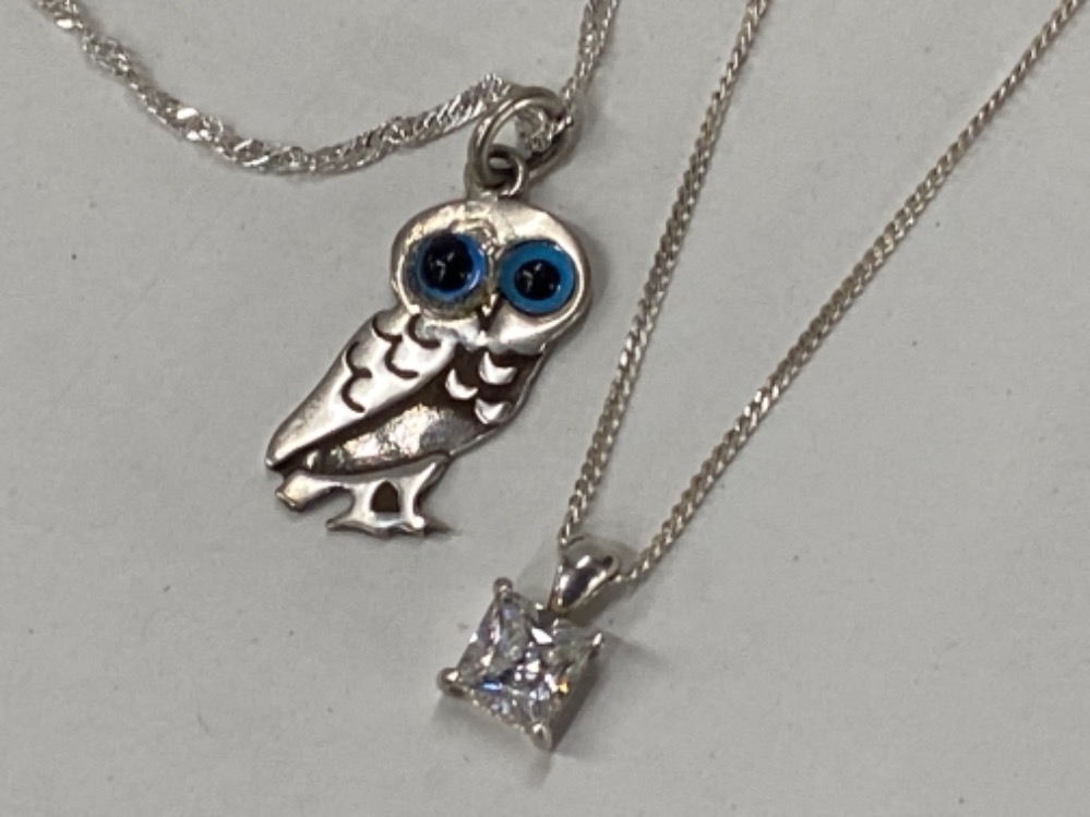 SILVER OWL WITH GLASS EYES PENDANT ON DOUBLE LINK TWISTED 19’’ CHAIN TOGETHER WITH A SILVER CAGED