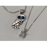 SILVER OWL WITH GLASS EYES PENDANT ON DOUBLE LINK TWISTED 19’’ CHAIN TOGETHER WITH A SILVER CAGED