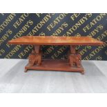 A BEAUTIFULLY CARVED ELEPHANT EXOTIC HARD WOOD COFFEE TABLE