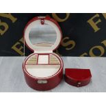A RED LEATHER JEWELLERY BOX WITH LIFT OUT TRAY AND SMALL LEATHER COMPARTMENT BOX