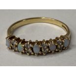 9CT YELLOW GOLD OPAL AND CUBIC ZIRCONIA SET BAND RING, 1.4G SIZE L