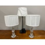 A PAIR OF CUT GLASS TABLE LAMPS WITH WHITE SHADES 42CM HIGH OVERALL TOGETHER WITH ANOTHER