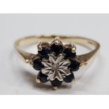 9CT YELLOW GOLD DIAMOND AND SAPPHIRE FLAVE CLUSTER RING COMPRISING OF A SMALL SINGLE DIAMOND
