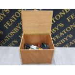 VINTAGE METAL BOUND WOODEN CHEST WITH TWIN HANDLES CONTAINING A SELECTION OF TOOLS SUCH AS SAWS ETC