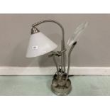 A TABLE LAMP WITH MAGNIFYING GLASS AND CLIP