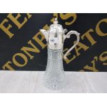 A MOULDED GLASS CLARET JUG WITH EPNS MOUNTS