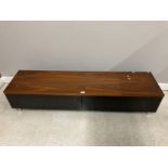 A MODERN ROSEWOOD EFFECT AND GLASS TV AND HIFI UNIT WITH DROP DOWN FRONT