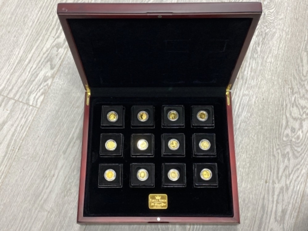 GOLD SET OF 12 X 9 CARAT COINS FROM TRISTAN DA CUNHA, EACH WEIGHING 1G, SUPPLIED BY THE LONDON