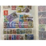 ALBUM OF VINTAGE STAMPS FROM AROUND THE WORLD AUSTRALIA, CANADA, SPAIN ETC