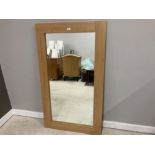 A MODERN WALL MIRROR IN OAK EFFECT FRAME 140 X 80CM