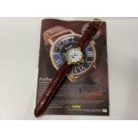 GENTS GOLD PLATED STAUER WRISTWATCH WITH BROWN LEATHER STRAPS AND BROCHURE