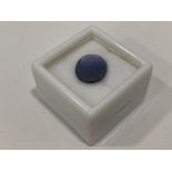 4.70 CARAT BLUE SAPPHIRE WITH INTAGLIO CREST CARVING