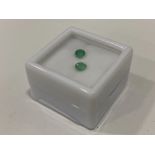 0.55 CARATS PAIR OF ROUND CUT EMERALDS