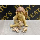 3 ITALIAN CHERUB FIGURES PLAYING MUSICAL INSTRUMENTS TOGETHER WITH A LARGE POTTERY CHERUB