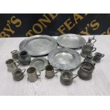 A COLLECTION OF PEWTER ITEMS SUCH PEWTER PLATES PUB MEASURES ETC