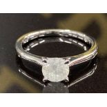 AN 18CT WHITE GOLD AND DIAMOND SOLITAIRE RING F COLOUR I3 CLARITY SIZE L 1/2 2.7G GROSS CERTIFIED
