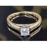 A 9CT YELLOW GOLD AND DIAMOND SOLITAIRE RING .26CT DIAMOND COLOUR G CLARITY I1 SIZE H 2.2G GROSS