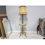 A BRASS AND ONYX STANDARD LAMP WITH SHELF AND BLUSH SILK TASSEL SHADE 183CM OVERALL