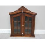 A MAHOGANY WALL HANGING DISPLAY CABINET WITH TWIN GLAZED DOORS 56CM BY 61CM