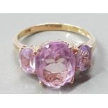 A SILVER GILT AND AMETHYST THREE STONE RING SIZE S 4.1G GROSS