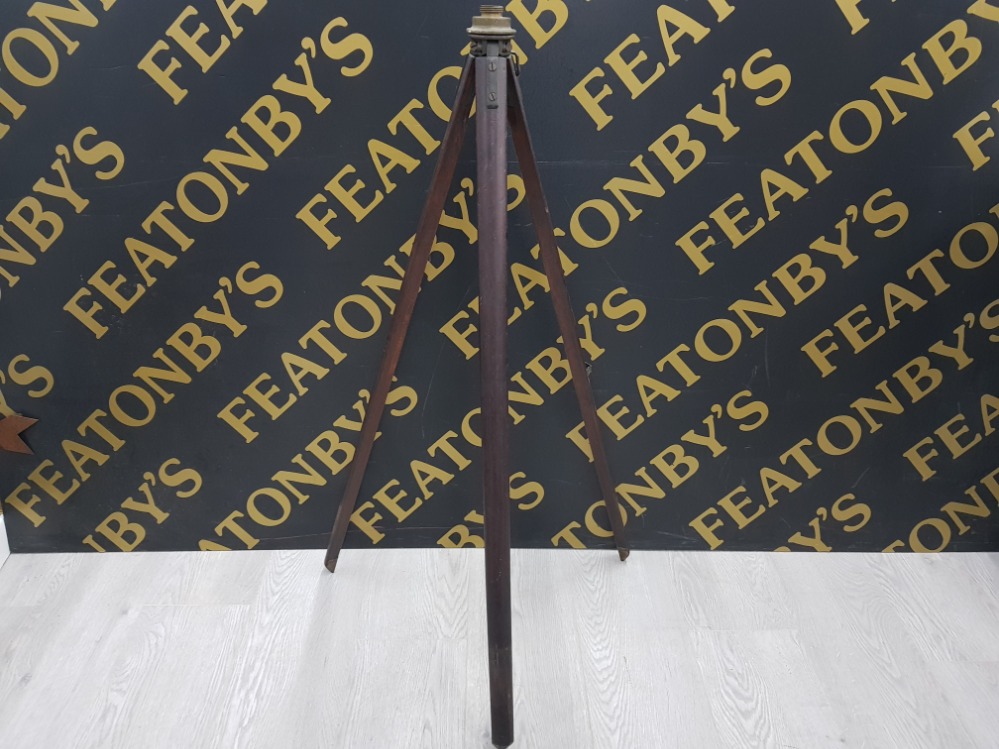 EARLY 20TH CENTURY WOODEN TRIPOD WITH BRASS FITTING