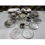 A LARGE LOT OF SILVER PLATED ITEMS SUCH AS LIDDED TUREEN TEAPOT PART CONDIMENT SETS ETC
