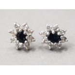 A PAIR OF 9CT WHITE GOLD WHITE AND BLACK STONE CLUSTER EARRINGS STAMPED 9K 1G GROSS