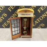 A VINTAGE TELEPHONE IN THE FORM OF A TELEPHONE BOX