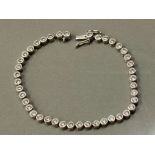 SILVER AND CZ LINE BRACELET 11.7G GROSS