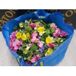 A BAG CONTAINING A LARGE AMOUNT OF ARTIFICIAL FLOWERS