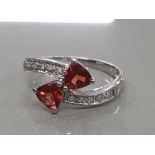 9CT WHITE GOLD RING WITH TWIN GARNETS AND SIDE DIAMONDS SIZE M 1.9G GROSS
